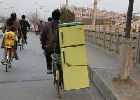 How to transport a refrigerator on a bicycle